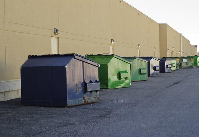 a large metal bin for waste disposal on the construction site in Fairview